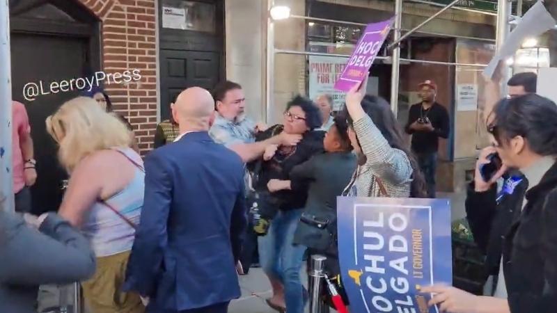 WATCH: Kathy Hochul supporter chokes woman protestor at campaign stop