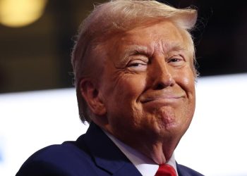 Kemp and Trump end feud with full throated embrace, upstaging Harris coronation night