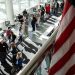 Make election day a federal holiday, require in-person voting