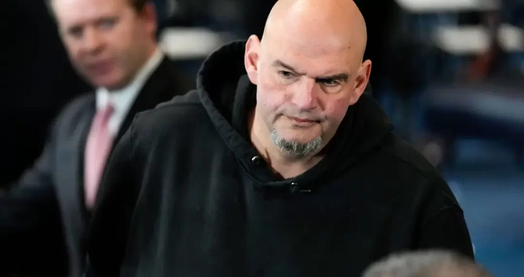 Fetterman Votes With Republicans to Advance Hegseth, Says He Won’t Switch to GOP