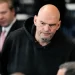 Fetterman Votes With Republicans to Advance Hegseth, Says He Won’t Switch to GOP